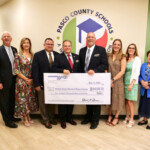 WREC Presents Pasco County School Board A Check For 400 000