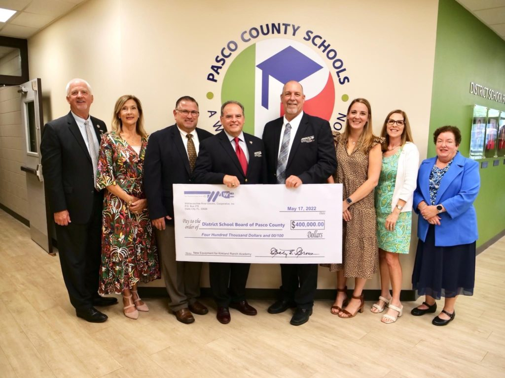 WREC Presents Pasco County School Board A Check For 400 000 